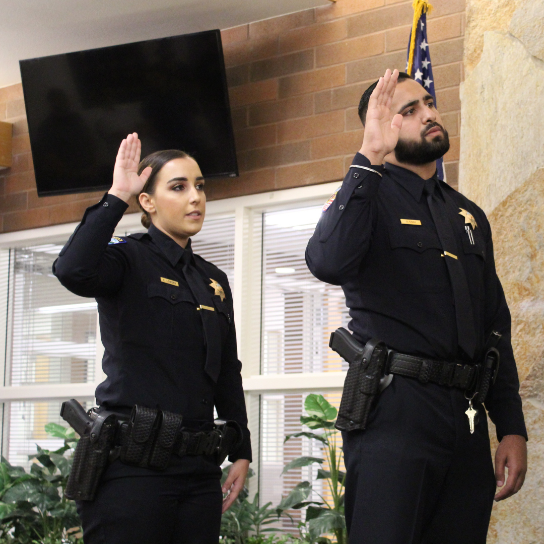 CPD Officers taking their oath as they are sworn in.