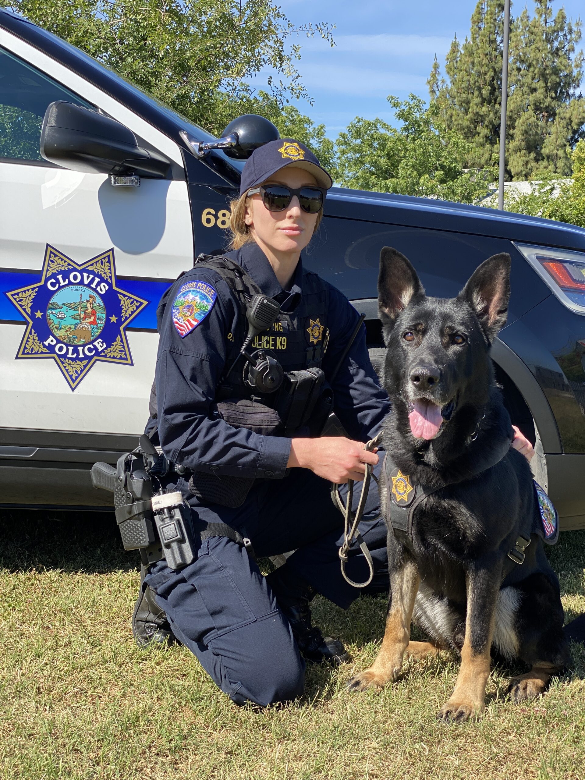 Portrait of Officer de Jong with K9 Mika